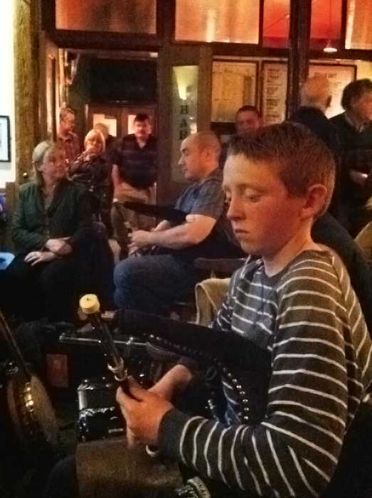 Two uillean pipers in session
